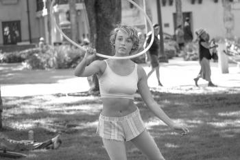Woman In White Sports Bra And Shorts Holding Hoop