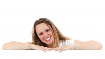 Woman in White T Shirt Smiling