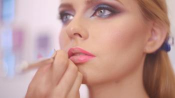 Professional lips make-up. Lipgloss and brush. Lipstick. Beauty girl ...