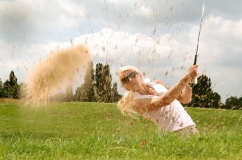 Woman Playing Golf during Daytime