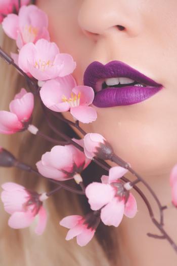 Woman Showing Her Purple Lipstick