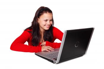 Woman Using Gray and Black Laptop