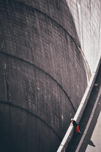 Woman Wearing Black Shirt Looking Down Through Hoover's Dam