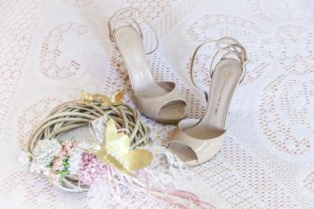 Women's White Stiletto Sandals on White Floral Design Textile