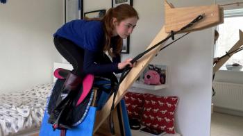 Girl Practices Riding On Wooden Horse - YouTube