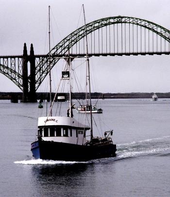 Fishing boat at Yaquina Bay Bridge, Newport, Oregon. See more photos ...