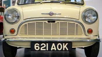Yellow Classic Car With 621 Aok Licensed Plate