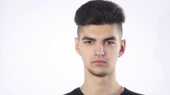 portrait of angry serious young man, boy isolated over white ...