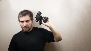 young man with binoculars