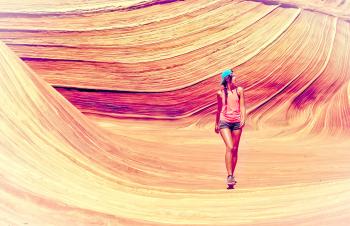Young Woman Exploring Canyon - Vitality and Adventure