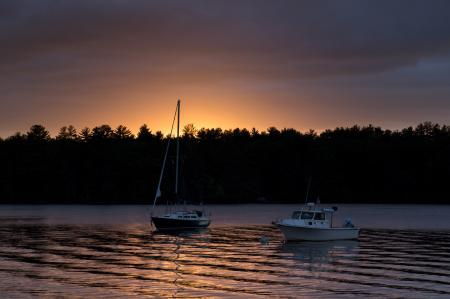 2 Speed Boat on Body of Water during Sunrise