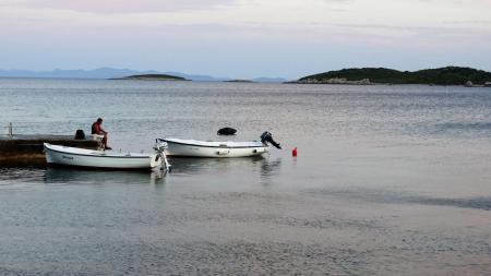 2 White Boat on Beach during Daytime