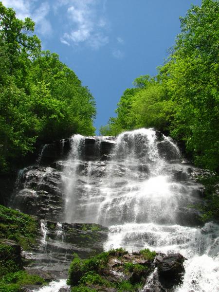 A large waterfall over rocks
