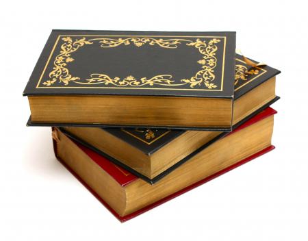 A stack of old books isolated on a white