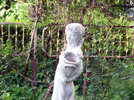 A statue in a garden