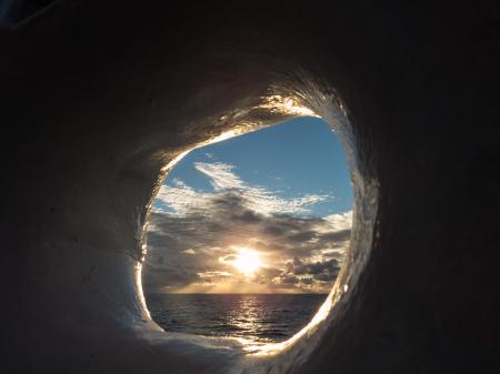 A view to the Sun through ship board