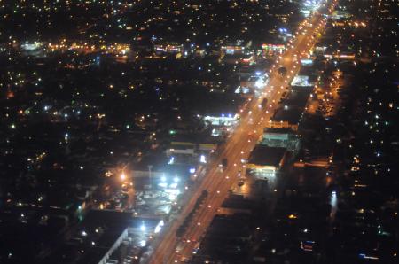 Aerial night photo of street with trees