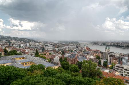 Aerial Photo Of A City Near Body Of Water