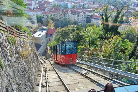 Aerial Photography of Red and Black Train With Village View