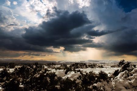 Aerial View of City Against Cloudy Sky