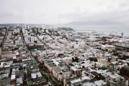 Aerial View of City Under Cloudy Sky