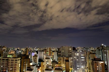 Aerial View of City With High Rise Building at Night Time