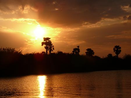 African sunset on river