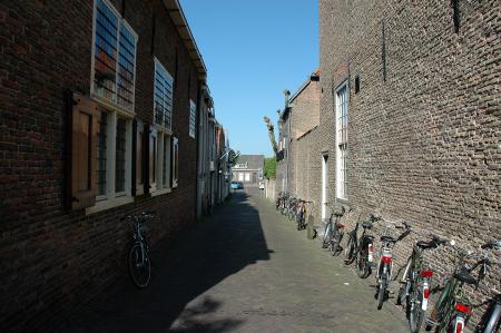 Alley with parked bicycles