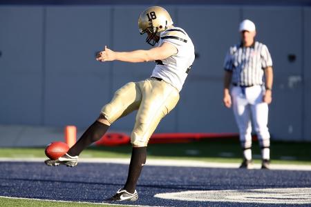 American Football Kicking the Ball