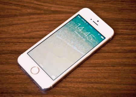 An iPhone 5s on a table