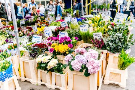 Assorted Flowers With Brown Wooden Rack