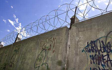 Barbed wire wall