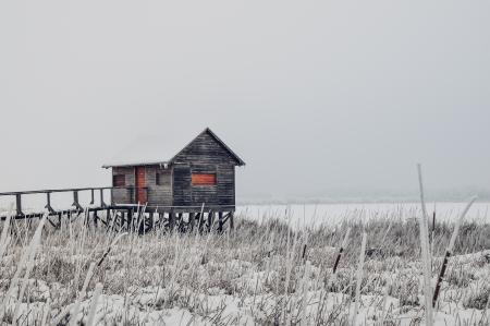 Barn on Field Against Clear Sky during Winter