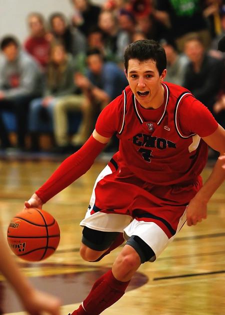 Basketball Player Wearing Red and Black Jersey