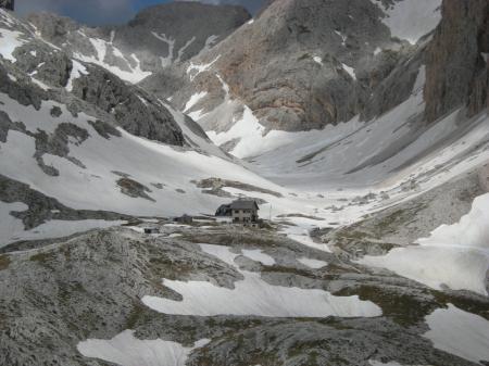 Beige 2-storey House on Snow Mountain