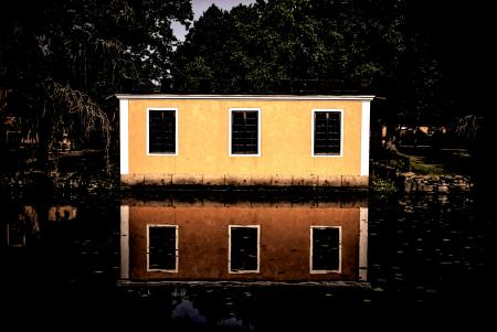 Beige and White House Beside Body of Water