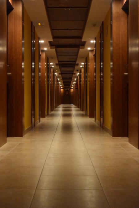 Beige Ceramic Tiled Corridor Inside Building