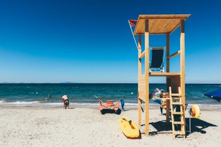 Beige Wooden Watch House Near Ocean