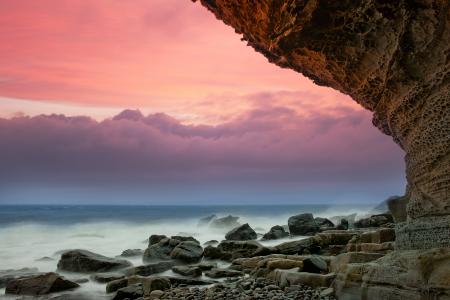 Big Stone at the Sea during Day Time