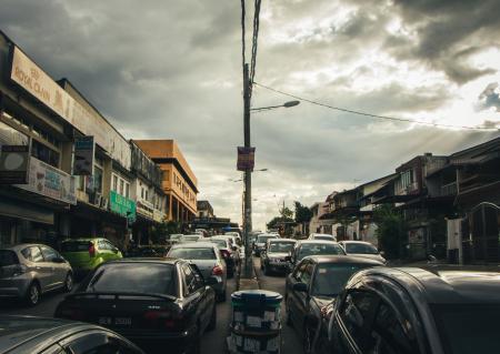 Black and Gray Car Under Cloudy Sky