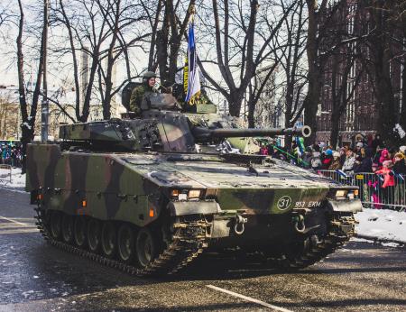 Black and Green Camouflage Military Tank Parade