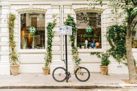 Black and White Bicycle Beside Post