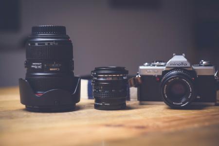 Black and White Dslr Camera Lens Beside Black Lens