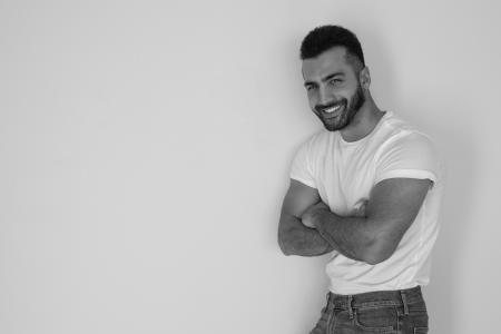 Black and White Photo of a Man Wearing White Shirt