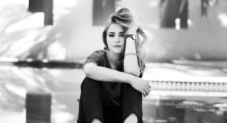 Black and White Photo of Woman in Crew-neck Shirt and Pants