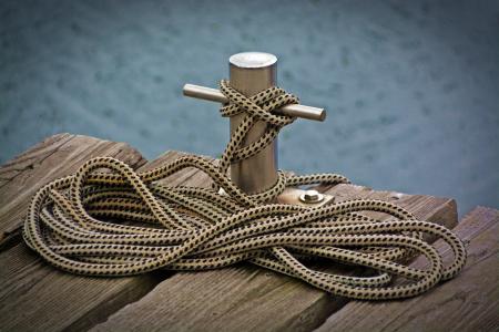 Black and White Rope Tied on Stainless Steel Tube