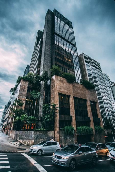 Black Building Across Cars Portrait