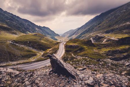 Black Car on Road Near Mountains