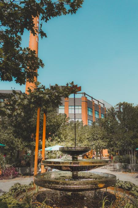 Black Concrete Water Fountain Under Blue Sky