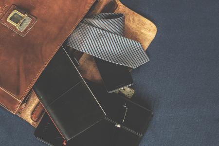 Black Leather Wallet Near the Necktie